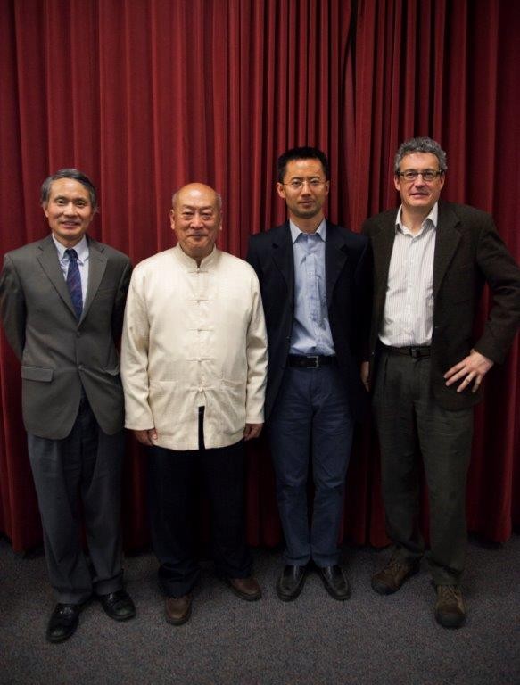 Master Victor Chiang posing with three other men